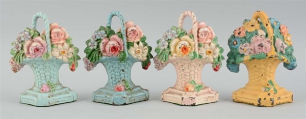 LOT OF 4: CAST IRON FLOWER SINGLE BOOKENDS.       