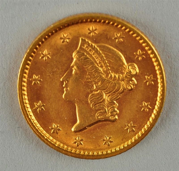 1853 $1 GOLD COIN.                                