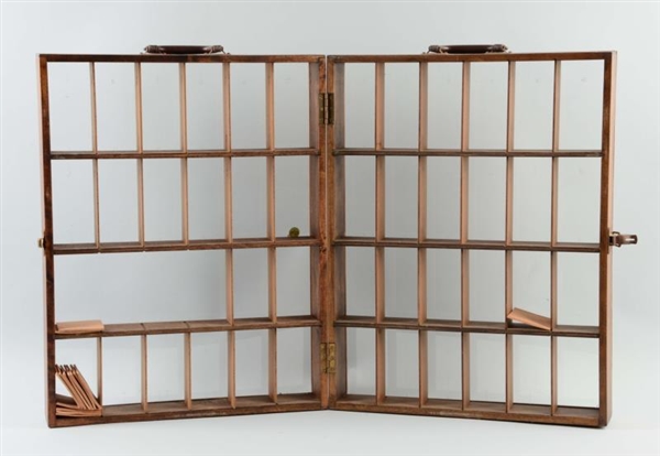 WOODEN DISPLAY CASE WITH LEATHER HANDLES.         