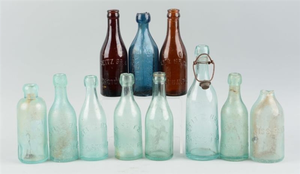 LOT OF 11:  SEITZ BREWERY EMBOSSED BOTTLES.       