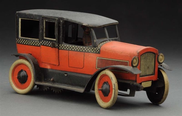 GERMAN TIN LITHO WIND-UP OROBR CHECKERED TAXI TOY.