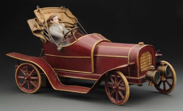 EARLY FRENCH CLOCKWORK CANVAS TOP ROADSTER.       