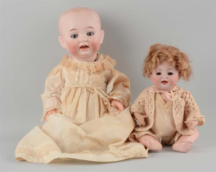 LOT OF 2: ANTIQUE GERMAN CHARACTER BABY DOLLS.    