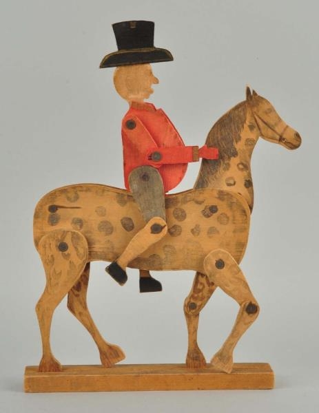 CRANDALLS WOODEN JOINTED MAN ON HORSE.           