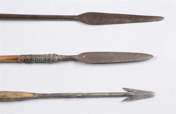 LOT OF 3:  UNKNOWN SPEARS ON WOOD SHAFTS.         