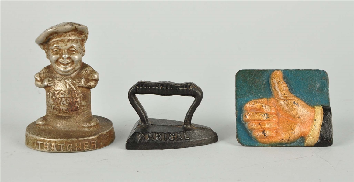 LOT OF 3: CAST IRON ADVERTISING PAPERWEIGHTS.