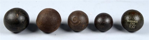LOT OF 5:  EXCAVATED CANNON BALLS.                