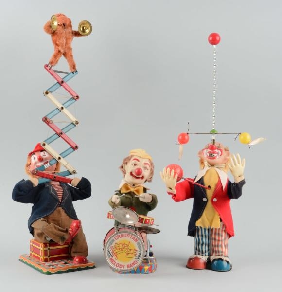 LOT OF 3: TIN LITHO BATTER OPERATED CLOWN TOYS.   