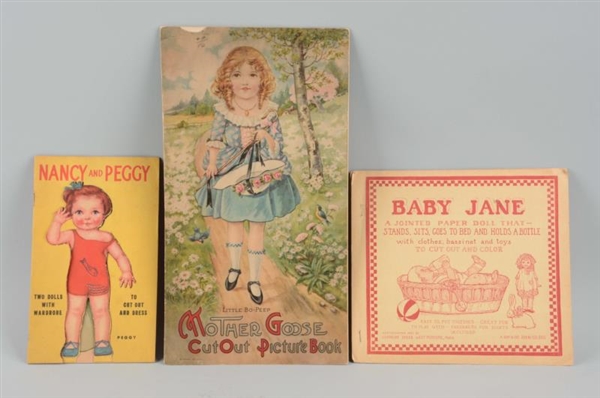 LOT OF 3: VINTAGE PAPER DOLL BOOKS.               