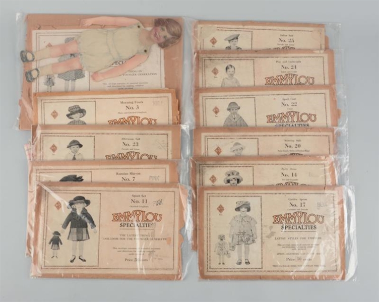 VINTAGE LARGE JOINTED PAPER DOLL WITH 11 PATTERNS.