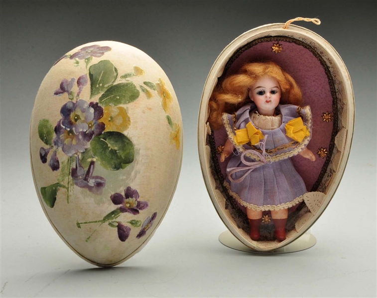 TINY F.G. DOLL IN EASTER EGG.                     