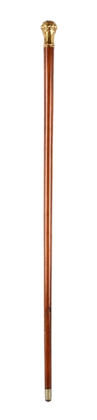 WALKING STICK WITH SOLID GOLD KNOB TOP.