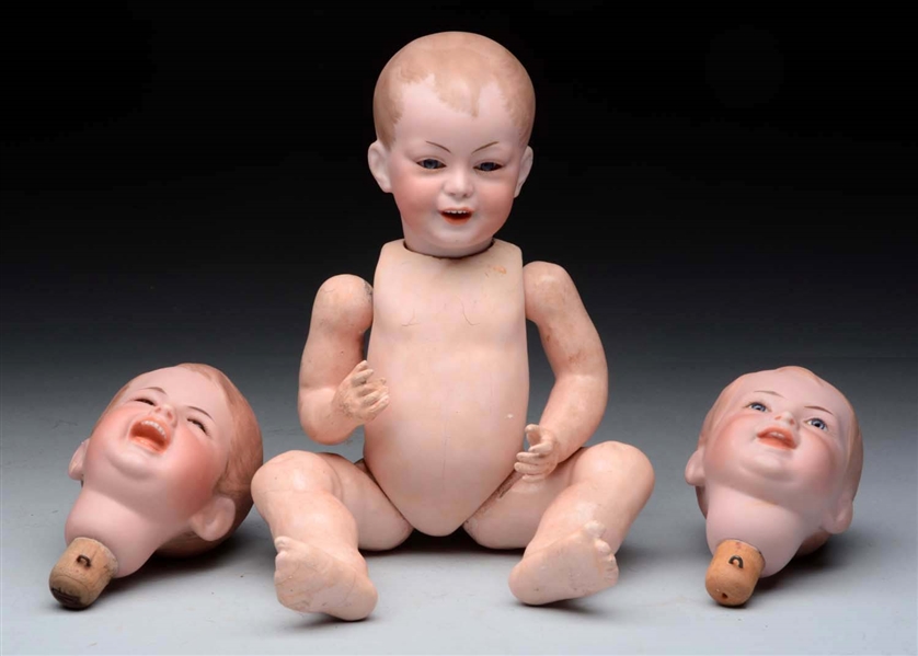 LOT OF 3: SFBJ CHARACTER BABY & TWO EXTRA HEADS.  