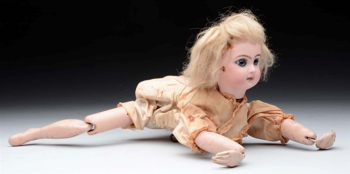 ONDINE FRENCH MECHANICAL SWIMMING DOLL.           
