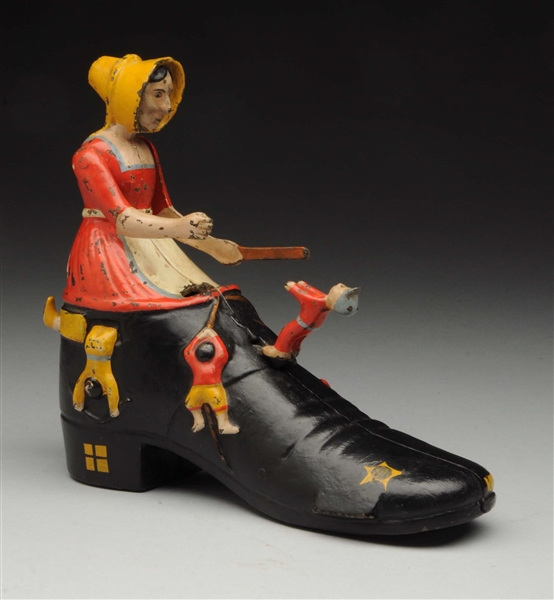 OLD WOMAN IN THE SHOE C.I. MECHANICAL BANK.