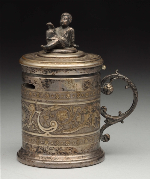 SILVER STEIN BANK WITH LEAD FIGURE OF CHILD ON TOP
