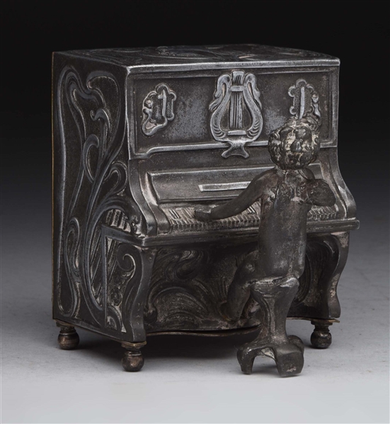 SPELTER SILVER ANGEL PLAYING PIANO MUSICAL BANK.