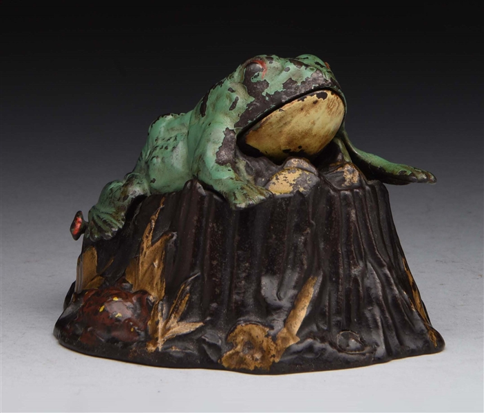 "TOAD ON STUMP" CAST IRON MECHANICAL BANK.