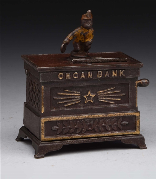 "SMALL ORGAN" CAST IRON MECHANICAL BANK.