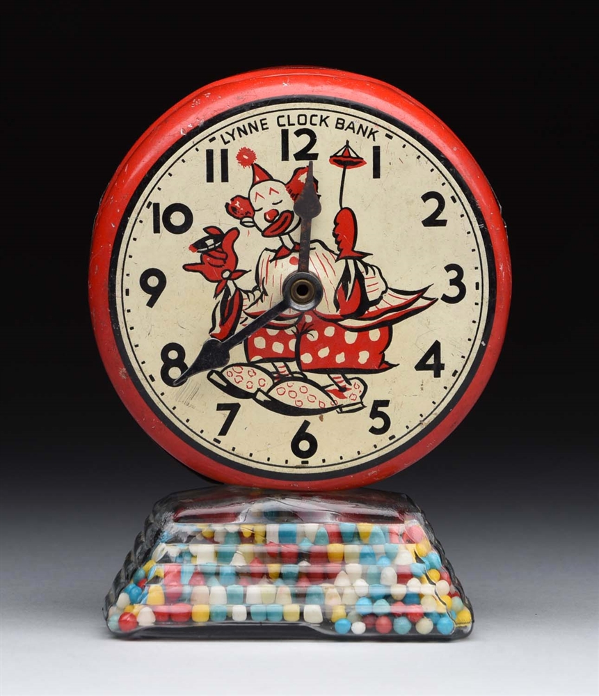 LYNNE BANK CLOCK CANDY CONTAINER.                                 