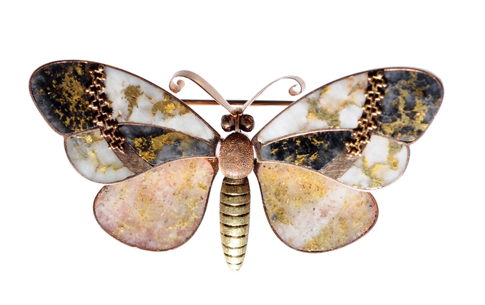 BUTTERFLY PIN GOLD IN QUARTZ.