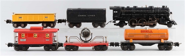 LOT OF 6: LIONEL NO. 1666 LOCOMOTIVE & FREIGHT CARS.