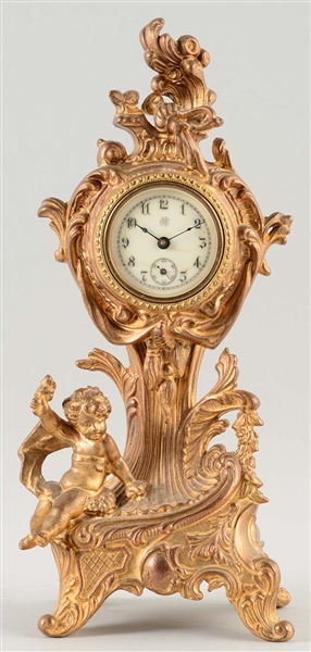 JENNING BROTHERS FIGURAL CLOCK WITH GOLD FINISH.