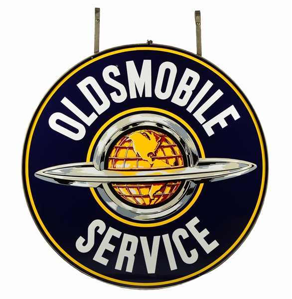 OLDSMOBILE SERVICE WITH WORLD LOGO SIGN.