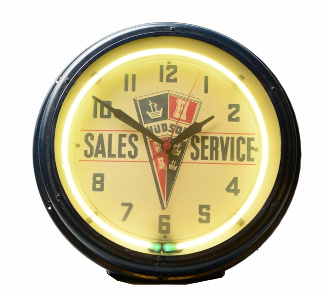 HUSDON SALES AND SERVICE NEON CLOCK WITH LOGO.