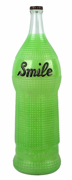 LARGE GLASS SMILE SODA ADVERTISING BOTTLE. 