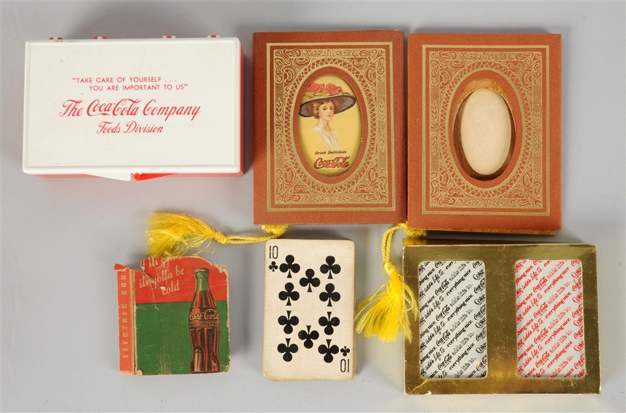 COCA - COLA COMMEMORATIVE POCKET MIRROR, FIRST AID KIT & PLAYING CARDS. 
