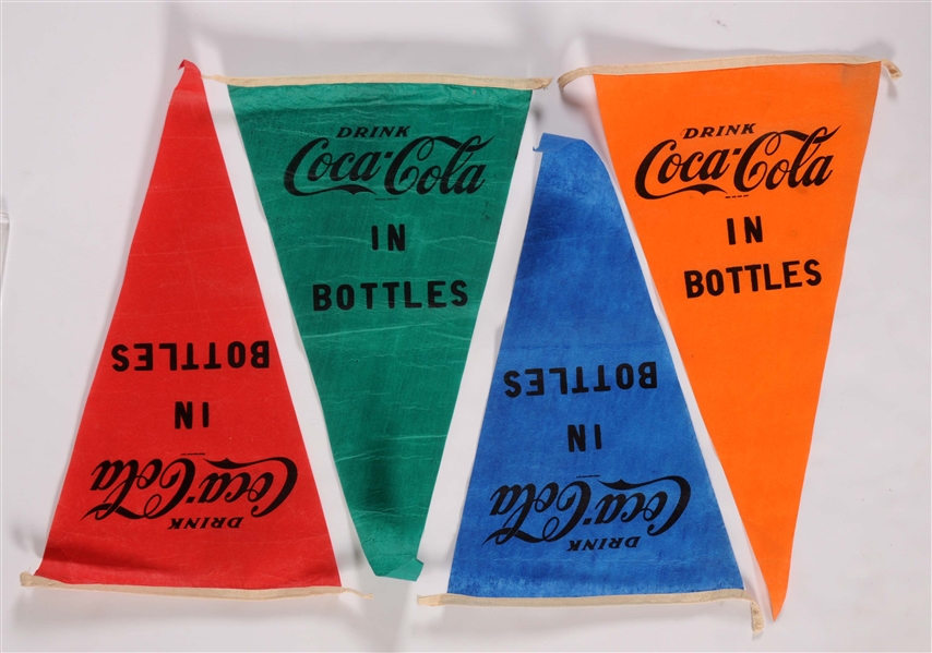 LOT OF 4: COCA-COLA ADVERTISING PENNANTS.