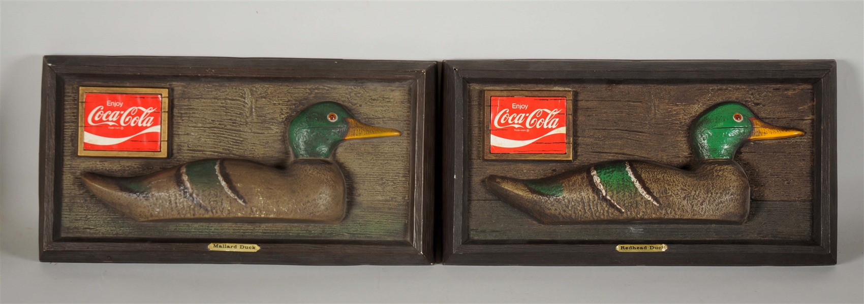 LOT OF 2: PLASTIC COCA-COLA SIGNS WITH DUCKS.