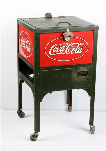 SMALL COCA-COLA COOLER ON WHEELS. 