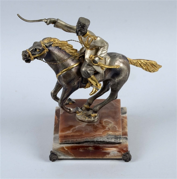 SCULPTURE OF A COSSACK CAVALRYMAN IN A CHARGE.    