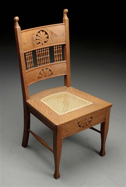 QUARTER SAWN OAK YOUTH CHAIR W/ CANED SEAT.