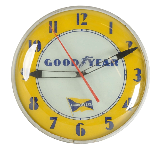 GOODYEAR LIGHTED CLOCK W/ WINGED FOOT & FLAG LOGO