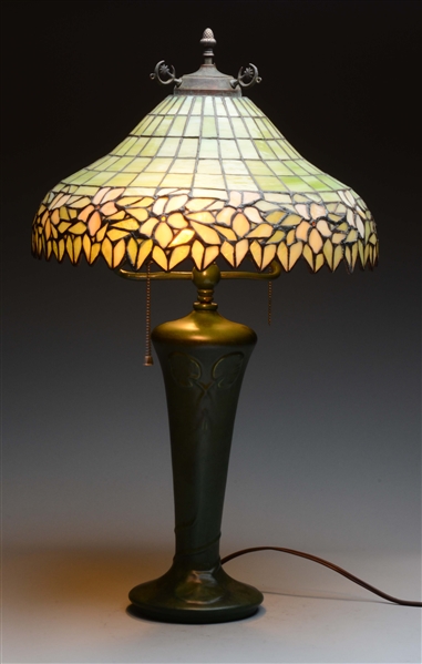 HAMPSHIRE POTTERY LAMP WITH LEADED GLASS SHADE. 
