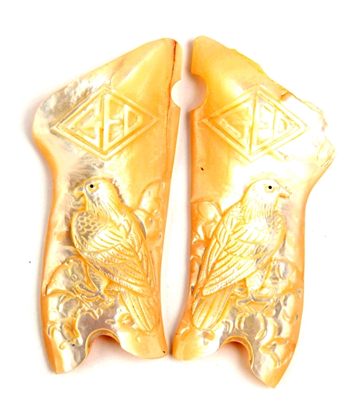 INCREDIBLE PAIR OF HAND CARVED REAL MOTHER OF PEARL PRESENTATION LUGER GRIPS.