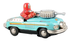 JAPANESE TIN LITHO BATTERY OPERATED ROBBY DRIVING STUDBAKER VEHICLE. 