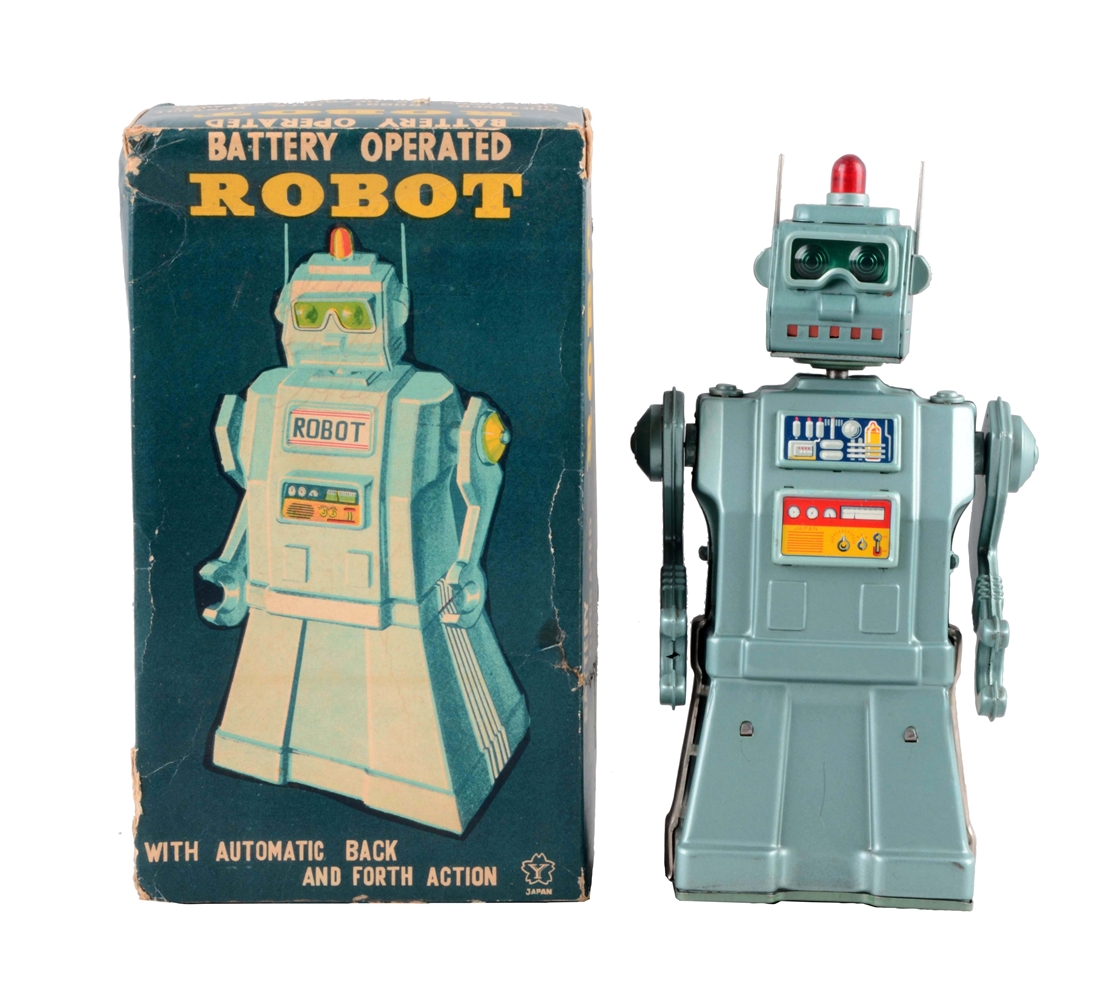 JAPANESE TIN LITHO BATTERY OPERATED GREEN VARIATION DIRECTIONAL ROBOT.