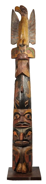 LARGE CURVED NATIVE AMERICAN TOTEM POLE.  