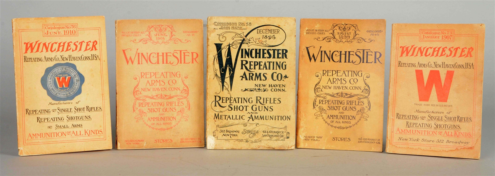 LOT OF 5: ASSORTED WINCHESTER REPEATING ARMS CO. CATALOGS.