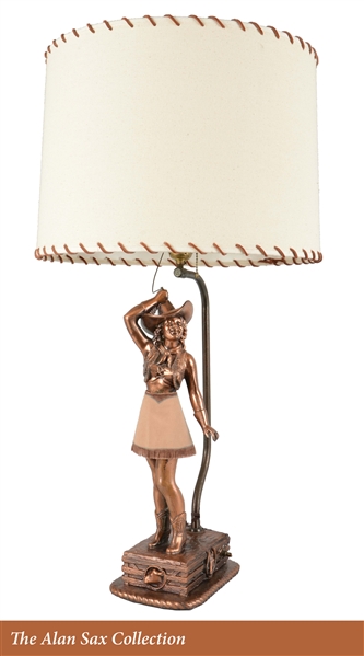 ANIMATED FIGURAL COWGIRL ELECTRIC TABLE LAMP.