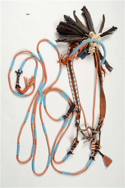 PLAINS BEADED BRIDLE WITH BIT AND BEADED REINS.