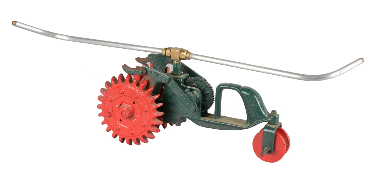 CAST IRON TRAVELING TRACTOR WATER SPRINKLER. 