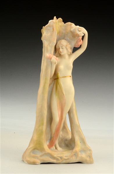 ERNST WAHLISS PORCELAIN FIGURE OF A YOUNG WOMAN PICKING APPLES.