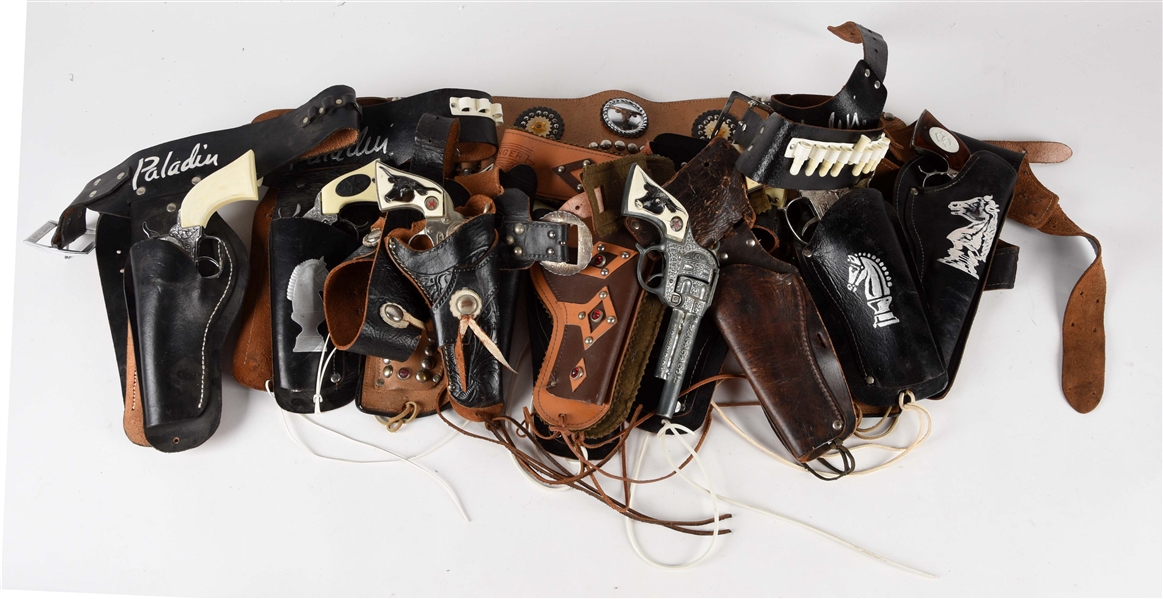 ASSORTED LOT OF PISTOLS WITH HOLSTERS.