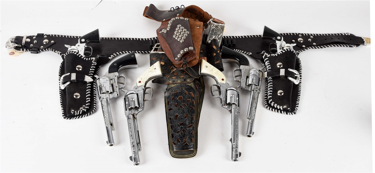 LOT OF 6: COWBOY PISTOLS WITH HOLSTERS.
