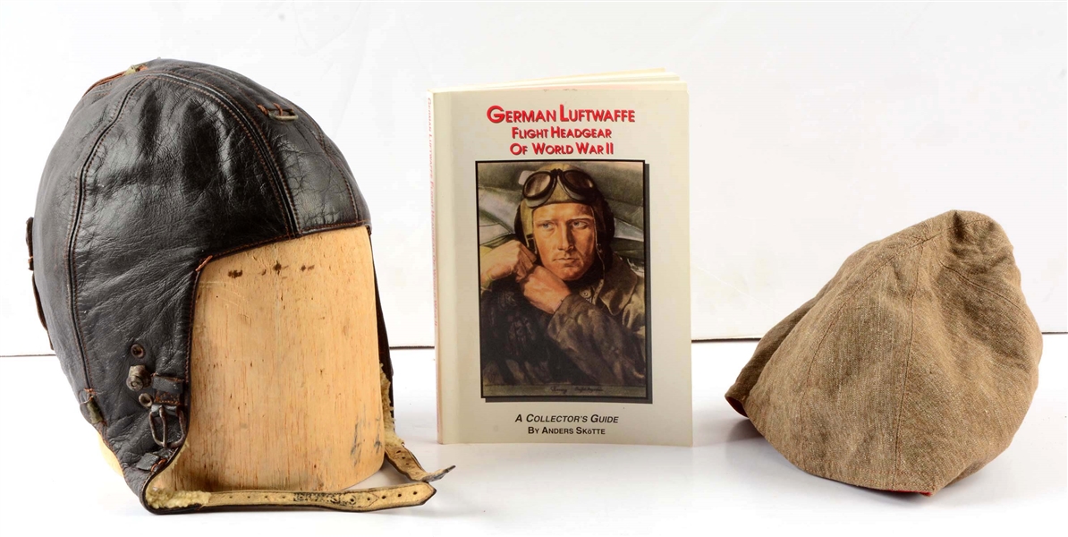LOT OF 3: RARE WWII GERMAN FLIGHT HELMET, SIGNAL COVER AND REFERENCE BOOK.